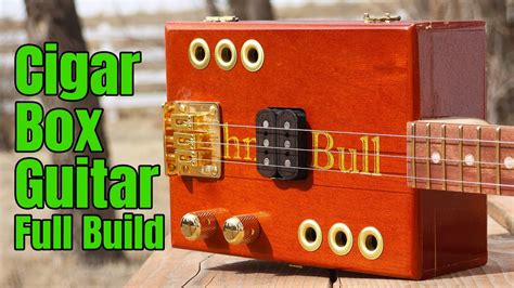 how to make a cigar box guitar louder without electric|cigar box guitar build.